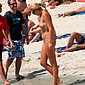 girl-at-beach-showing-pussy